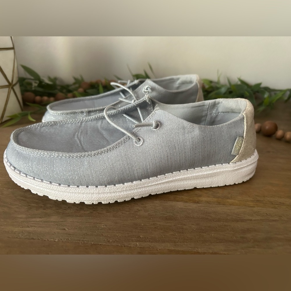 Women’s grey shimmery Hey Dudes lightly worn